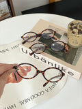 Miumiu Glasses Leopard